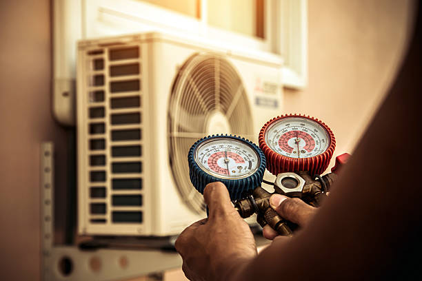 Professional Hvac Maintenance technician working in Green Harbor, MA